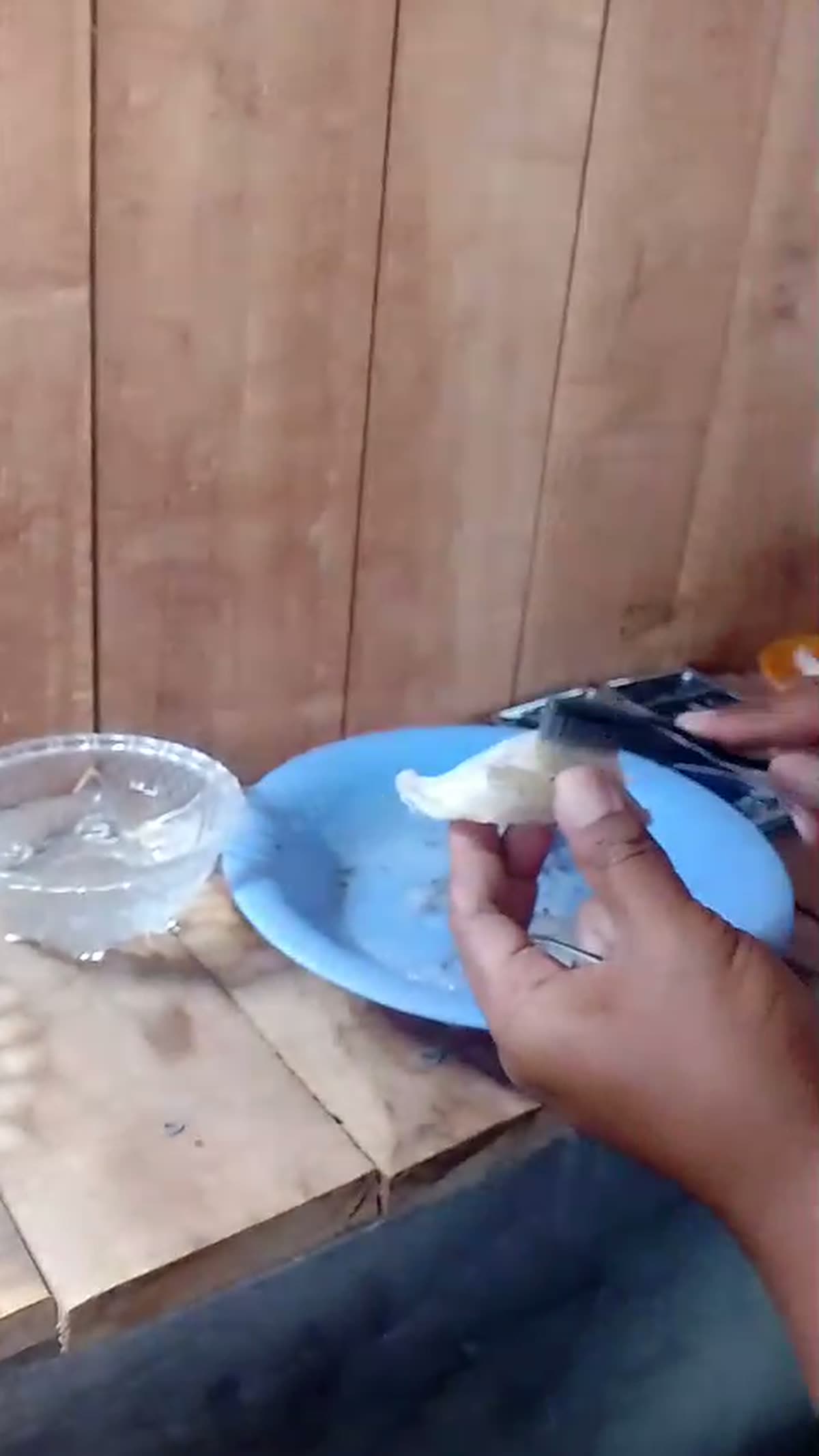 Cleaning edible bird’s nests one by one with tweezers